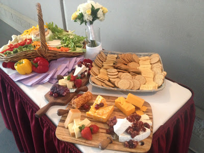 vegetable basket and cheese witwh crackers at wedding reception