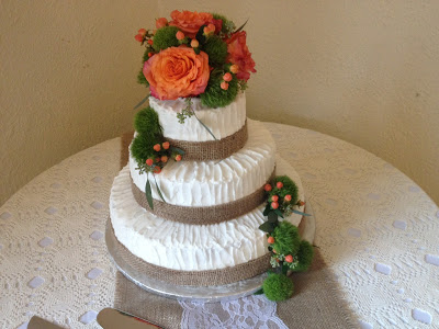 ribbon wedding cake with burlap