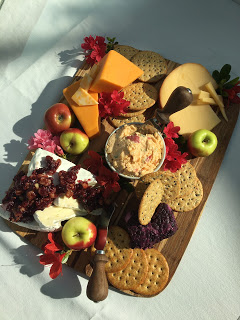 assorted cheeses with crackers