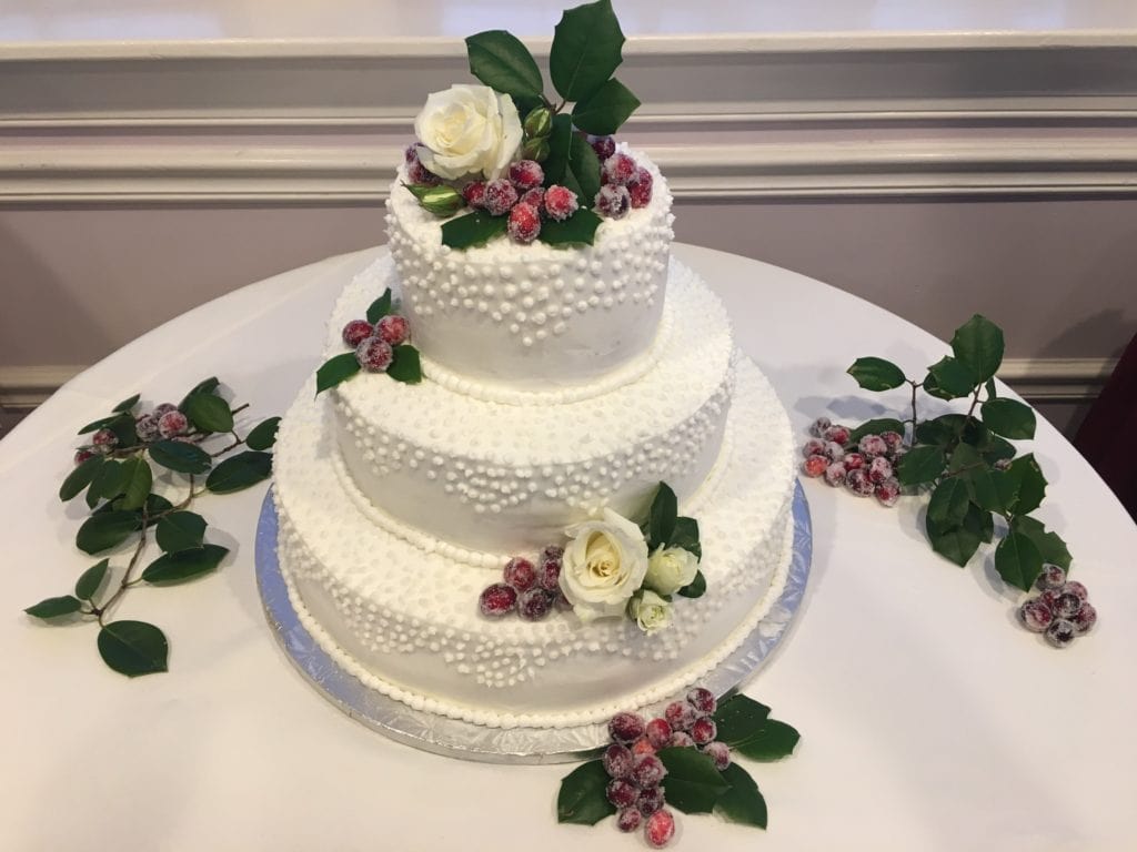 Winter Wedding Cake with Sugared Cranberry and Fresh Flowers